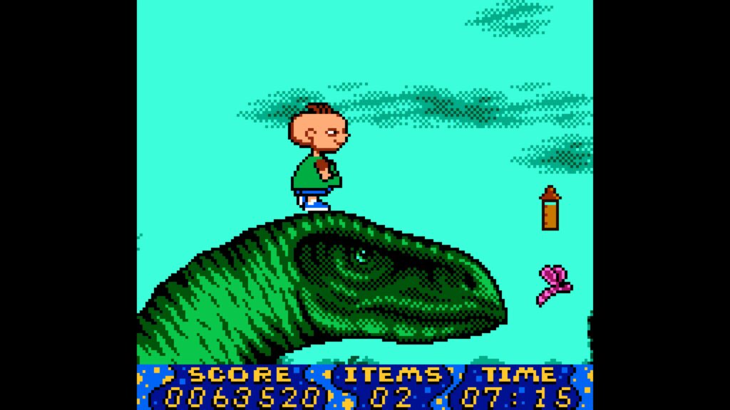 Rugrats Time Travelers Screenshot of Phil standing on a dinos head.